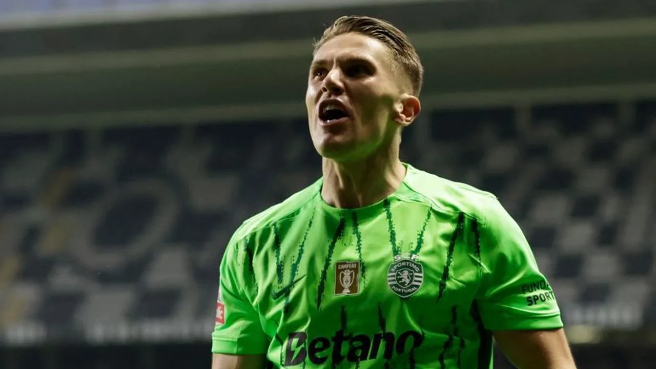 Viktor Gyökeres comemorando gol pelo Arsenal com camisa vermelha em campo inglês
