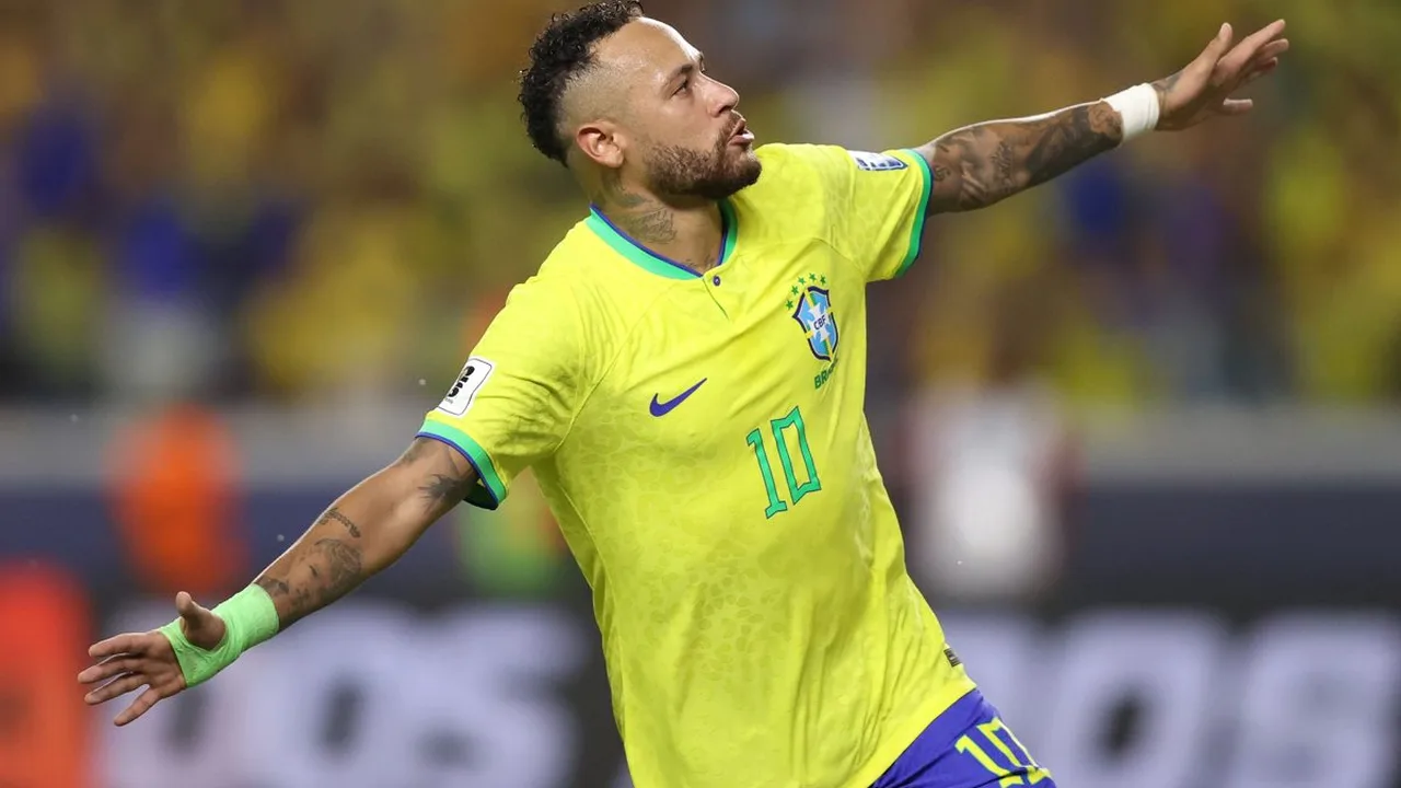 Estêvão do Chelsea sendo atendido no gramado após sofrer lesão na coxa direita durante partida