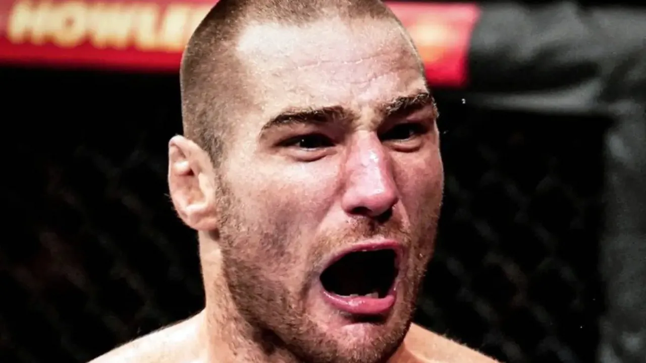 Khamzat Chimaev exausto após pesagem no UFC 328, rosto tenso, bastidores do evento em Newark