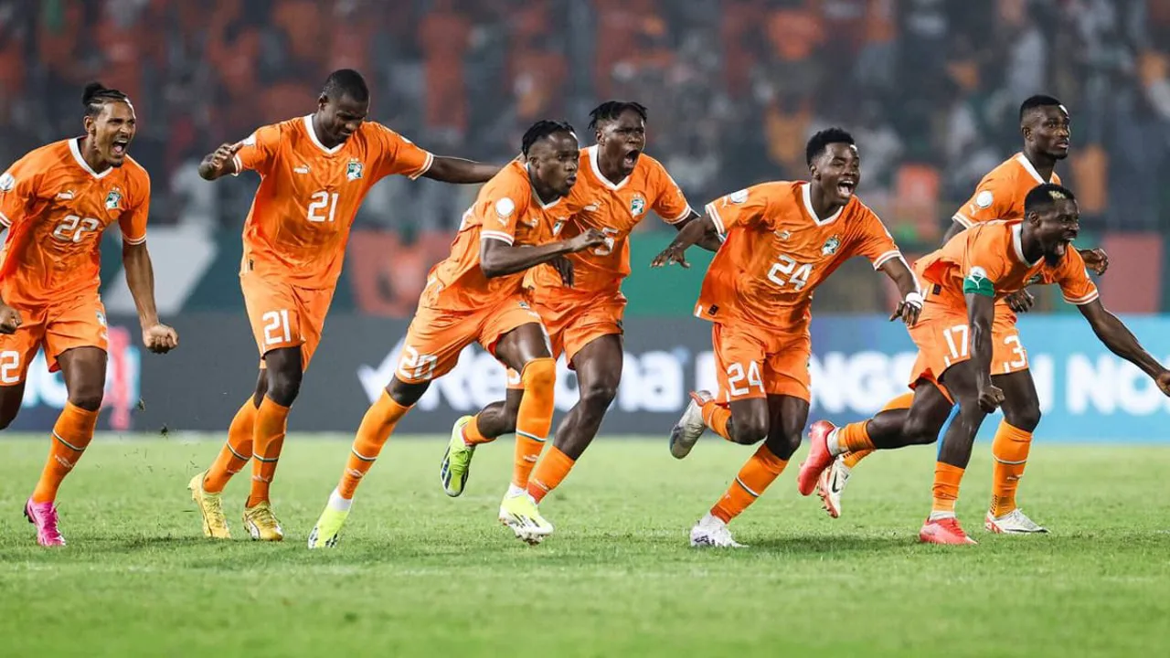 Jogadores da Costa do Marfim comemorando gol com a bandeira do país na Copa do Mundo 2026