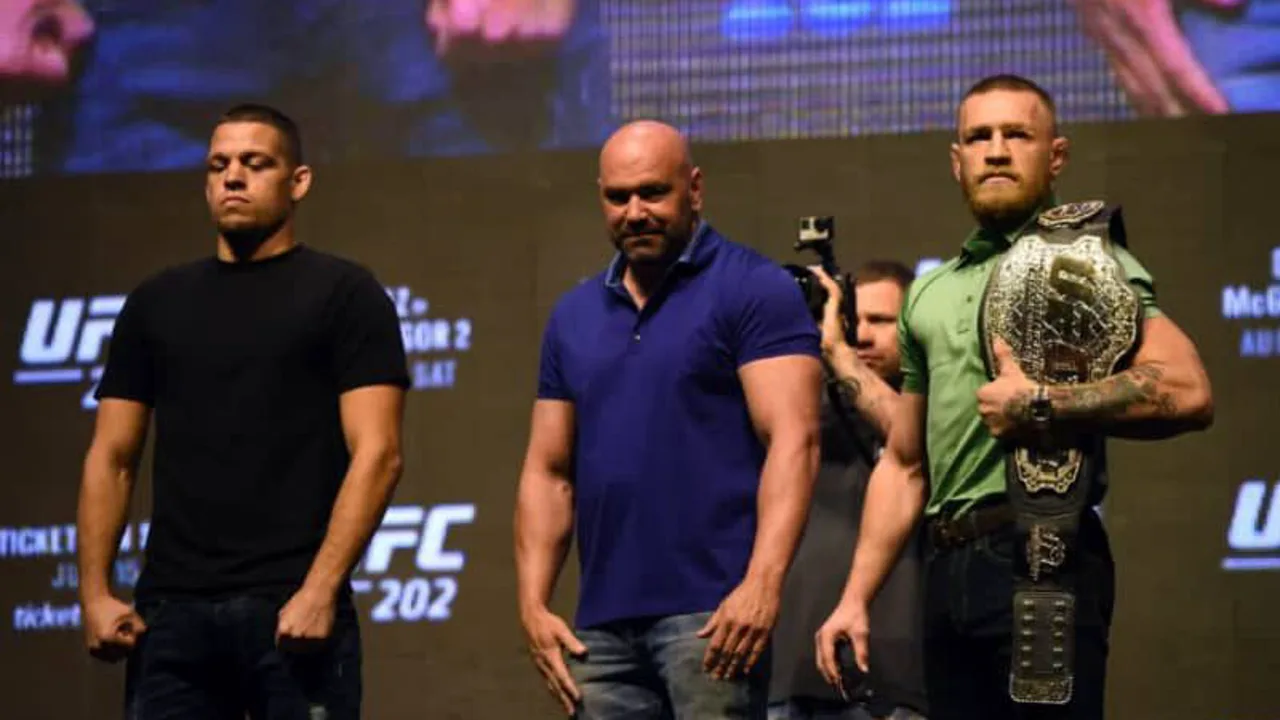 Nate Diaz e Conor McGregor frente a frente no octógono do UFC, olhares intensos antes do combate