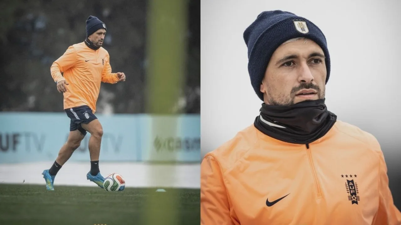 Arrascaeta com a camisa do Uruguai durante treino, com expressão de dor segurando a panturrilha direita